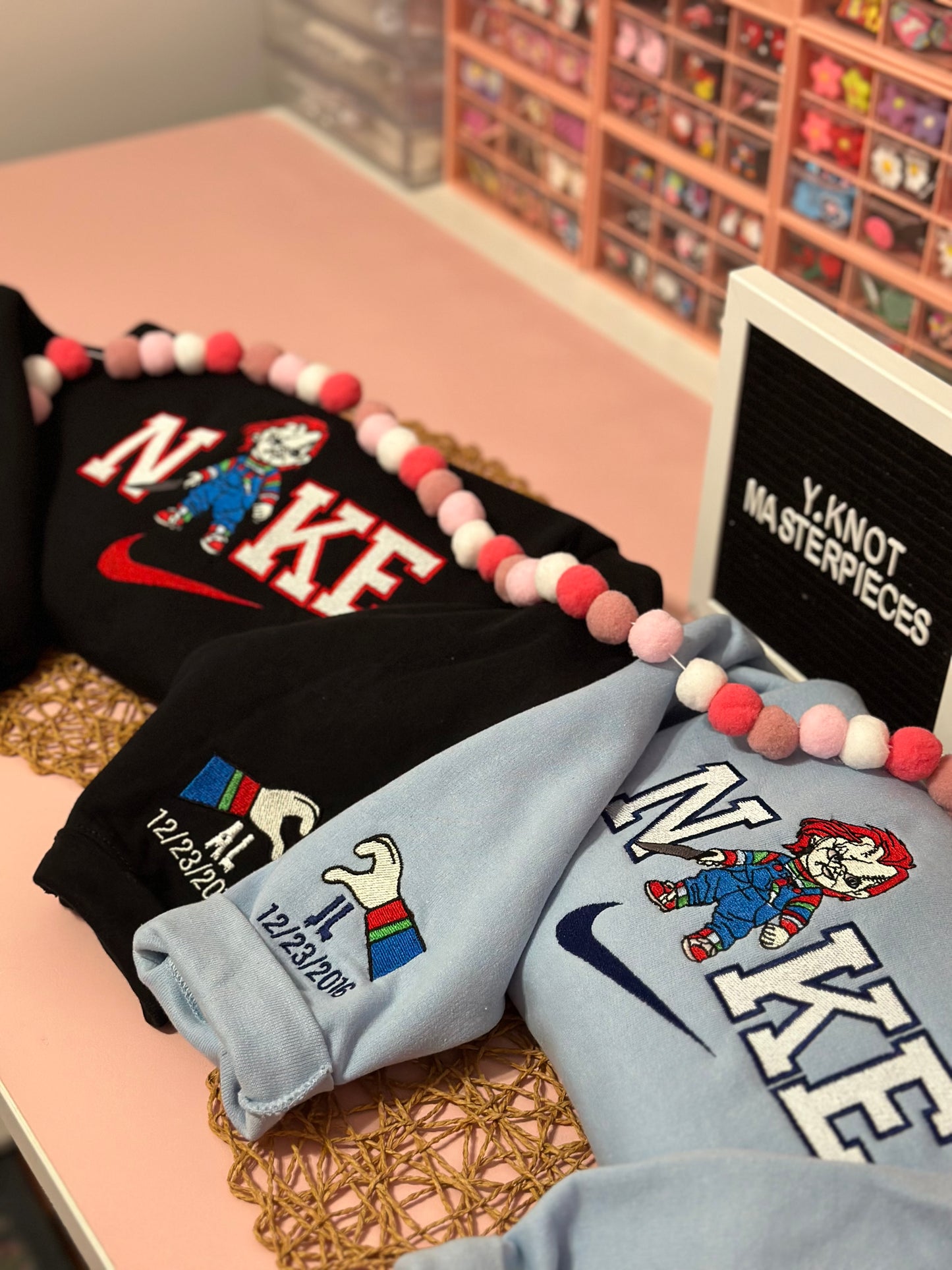 CHUKY AND BRIDE SWOOSH SWEATERS